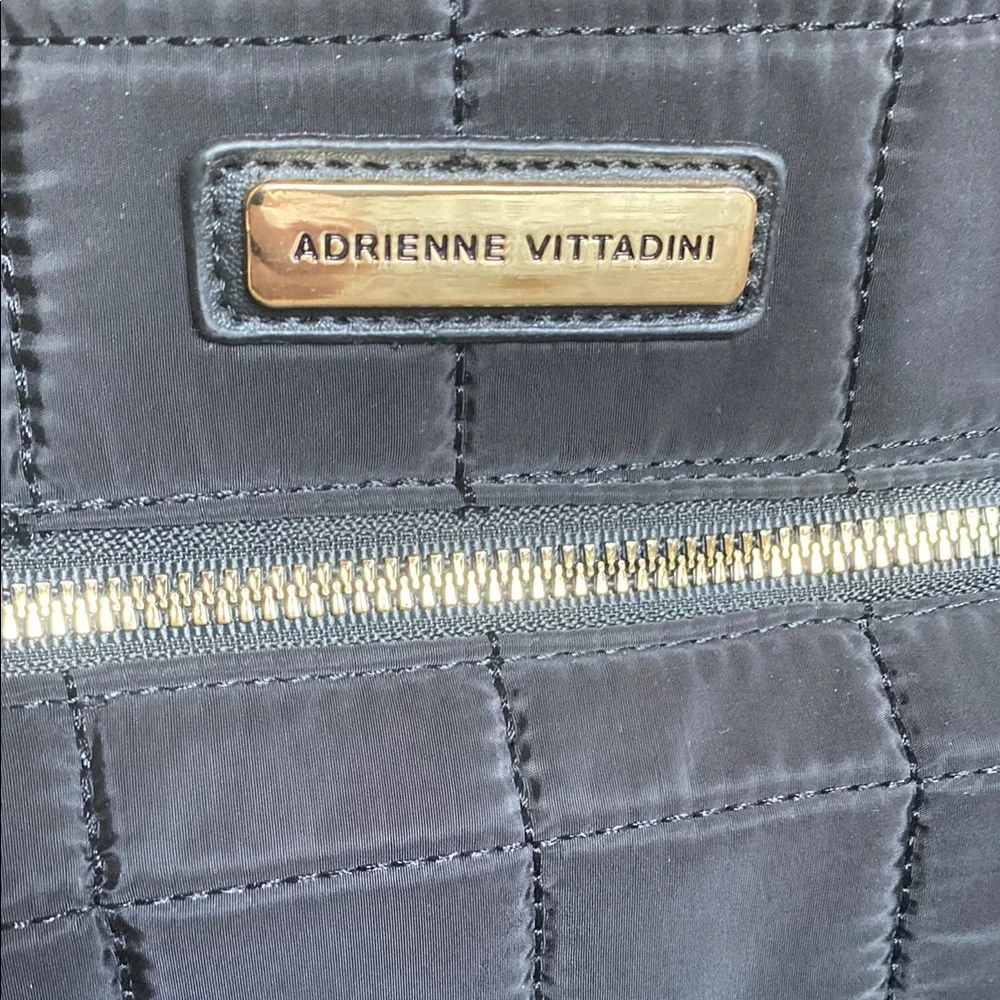 Adrienne Vittadini Black and Gold Backpack with Quilted Design Excellent cond.